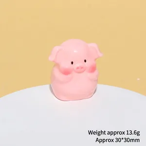 Macro detail of a 30mm cute pink resin pig figurine with 13.6g weight specifications