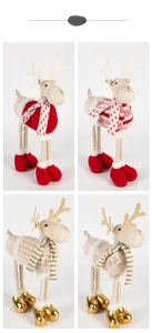 Detailed set of four Christmas plush reindeer ornaments with festive knit scarves and boots
