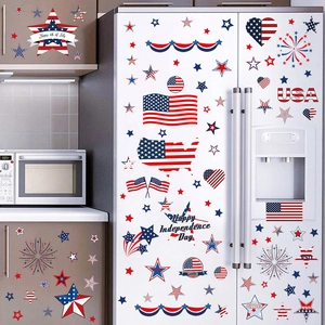 Independence Day window clings set with USA flags and stars on kitchen appliances