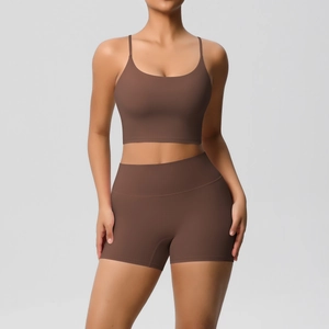 Detailed view of cocoa brown yoga set featuring thin strap top and high waist gym shorts