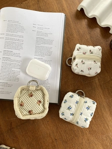 Three floral cotton zip pouches with metal hooks for AirPods and data cables storage
