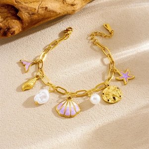 Gold stainless steel ocean bracelet with starfish, seashell pendants and pearls