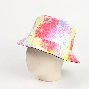 Detailed view of colorful floral bucket hat with vibrant digital flower print patterns