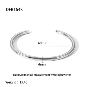 Technical drawing showing the 60mm diameter and 4mm width of the minimalist silver cuff