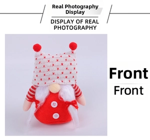 Front detail of Christmas gnome plush with red heart knit hat and white braided beard