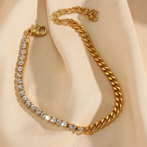 Detail showing gold Cuban link chain with sparkling zircon tennis chain and lobster clasp