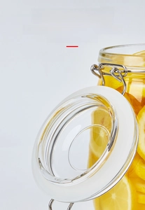 Detail of food-grade silicone seal ring and metal buckle on glass storage jar
