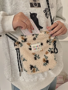 Cute plush flower crossbody bag in cream fleece with floral patterns for daily use