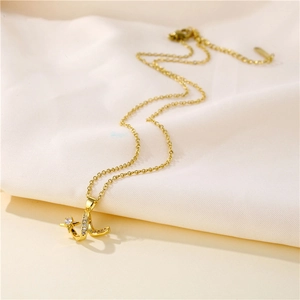 Golden wave clavicle necklace with zircon star pendant on luxury beige silk background