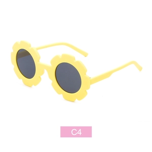Cute sunflower shaped kids sunglasses in matte yellow finish with round grey lenses