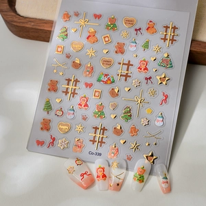 5D embossed Christmas nail stickers featuring gold bears, trees and snowflakes Co-339