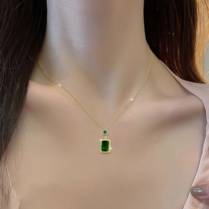 Elegant gold titanium steel necklace with square green gemstone and pavé micro diamonds
