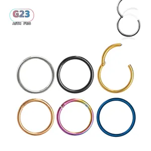 ASTM F136 titanium clicker hoops in six colors for ear, nose, and lip piercings