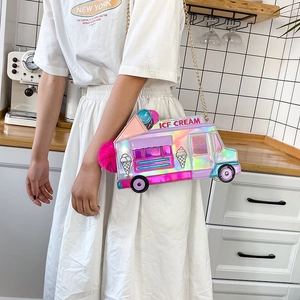 Detail of laser-effect ice cream truck cross-body bag with pink pompom and gold chain