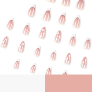 French white almond press-on nails with daisy flower patterns and fine glitter finish