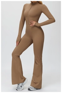 Detail of fleece-lined yoga jumpsuit featuring thumbholes and stand collar in brown