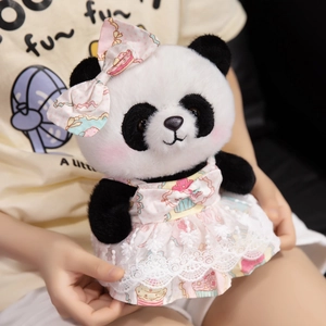 Cute panda plush doll in a pink cupcake dress with lace and matching bow headband
