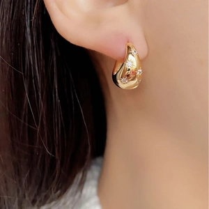 S925 silver starburst hoop earrings with teardrop design and sparkling zircon stones