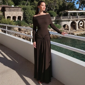 Detail of coffee brown off-shoulder dress with waist knot and pleated long sleeves