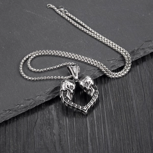 Collier punk vintage argenté avec pendentif en forme de cœur à double tête de mort
