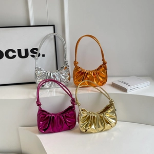Metallic pleated cloud underarm bags in silver, orange gold, rose red and light gold