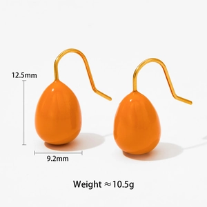 Detailed view of orange teardrop earrings with dimensions of 12.5mm by 9.2mm size