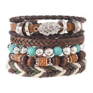 Multilayer Bohemian leather bracelet with turquoise beads and metallic leaf pendants