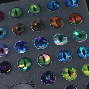 Macro shot of 3D dragon eye nail stickers with iridescent holographic glass cabochons