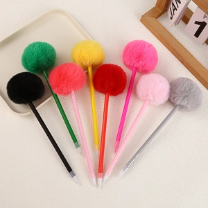Colorful plush ballpoint pens set in eight vibrant shades on a beige textured desk