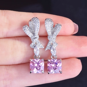 Radiant cut pink square diamond earrings with micro-set white zircon bow design