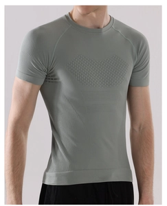 Close-up of grey compression shirt showing breathable mesh and seamless knit texture