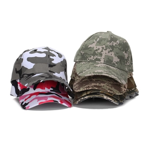 Stack of assorted camouflage baseball caps for men and women in various patterns