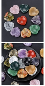 Macro display of diverse heart-shaped healing crystals in various colors and gemstones