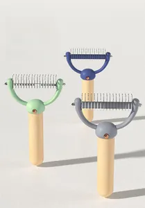 Detail of three grooming combs with beechwood handles and stainless steel blades