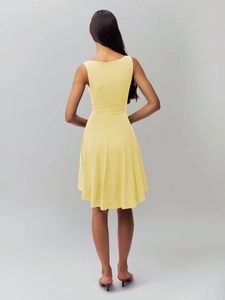 Rear view of slim fit yellow sleeveless A-line dress with cinched waist and back detail