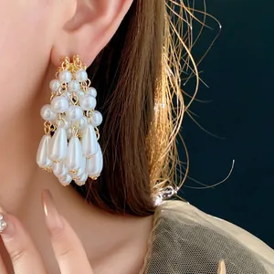 Elegant French style pearl tassel earrings with gold waterdrop pearls for a luxury look