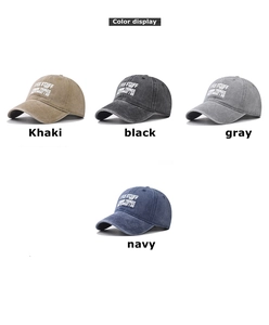 Detail showing four colors of washed cotton baseball caps with white letter embroidery