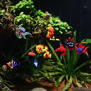 Floating glass fish tank ornaments with colorful sea creatures for creative aquarium decor