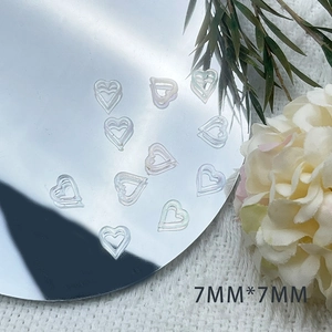 Hollow heart nail sequins in iridescent finish for manicure DIY art 7x7mm size
