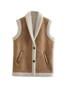 Detail of faux suede vest with soft white sherpa lining and button closure