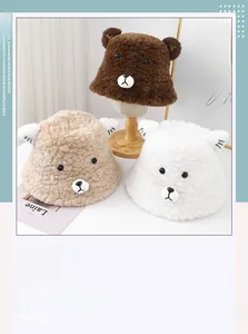 Close-up of soft faux fur texture and cute 3D animal ears on these plush winter bucket hats