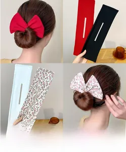 Detail of floral and solid hair bun makers with decorative bows for elegant hairstyles