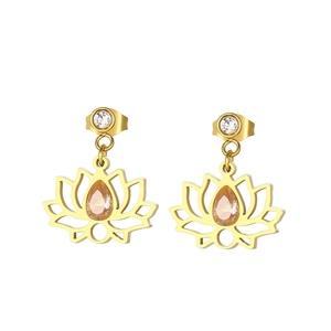 Detail of gold lotus earrings with amber teardrop zircon stones on white background