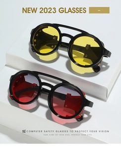 Detail view of vintage round sunglasses with side shields and colored gradient lenses