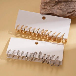 Lot de 12 boucles d'oreilles créoles géométriques dorées et argentées torsadées