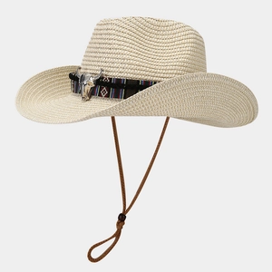 Straw Panama cowboy hat with ethnic band and metal bull head detail for sun protection