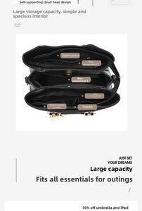 Internal structure of black leather tote bag showing large capacity and multi-compartment design