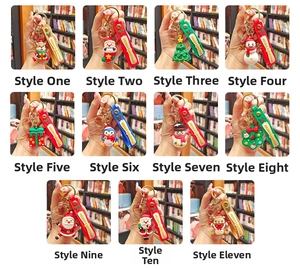 Detailed set of 11 PVC Christmas keychains with Santa, snowman and festive wristbands
