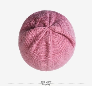 Detailed top view of purple knit beanie for women showing hexagonal stitching pattern