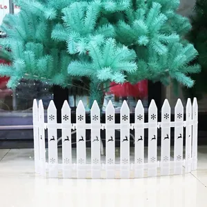 White PVC Christmas tree fence featuring reindeer and snowflake patterns for holiday decor